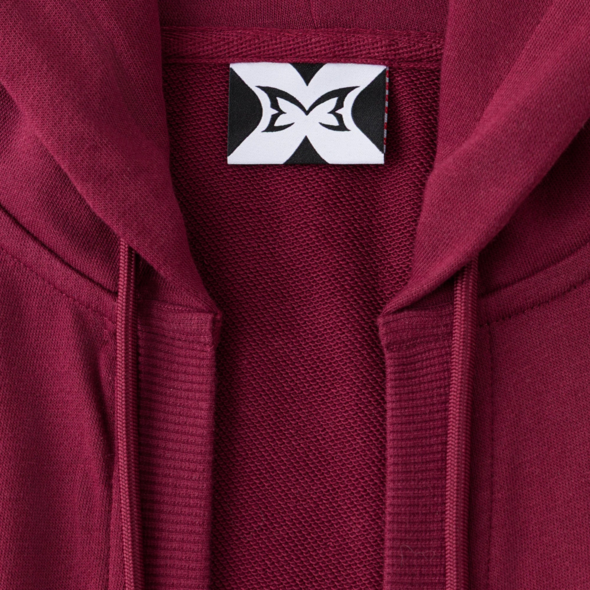 MERTRA WOMEN’S PIPING TOP MAROON