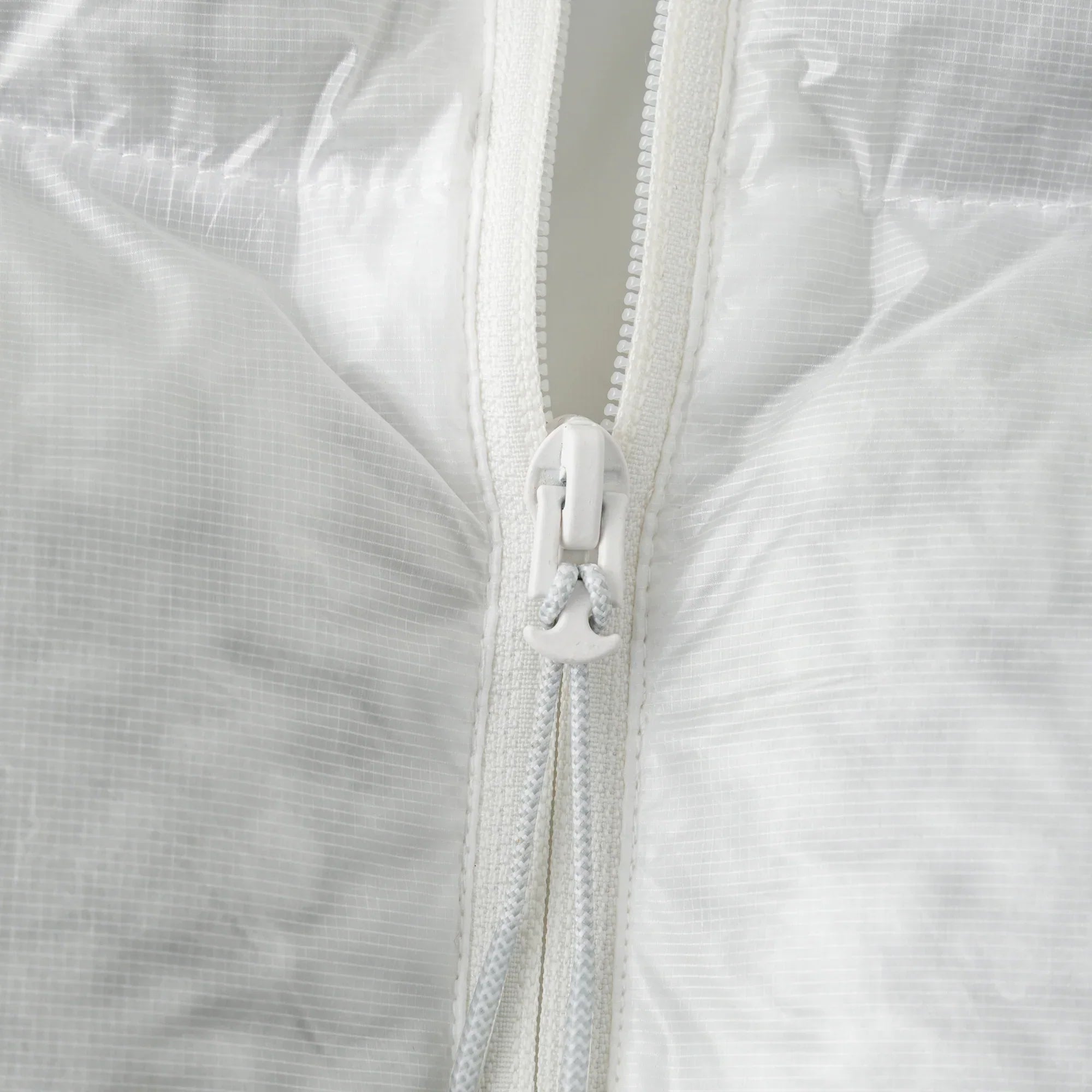 Mertra Translucent Puffer (Cloud) zip closeup